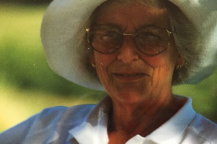 Anne Robson wearing a sun hat and sunglasses